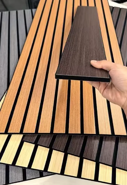 Customer photo of wood slat acoustic panels in several finishes